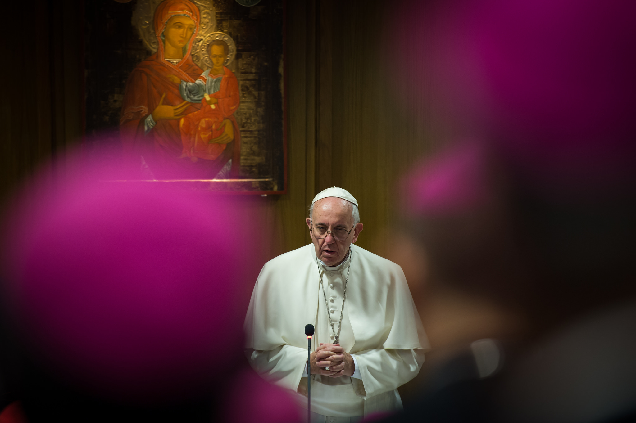 Pope Francis praying during the Synod of Bishops in the Vatican