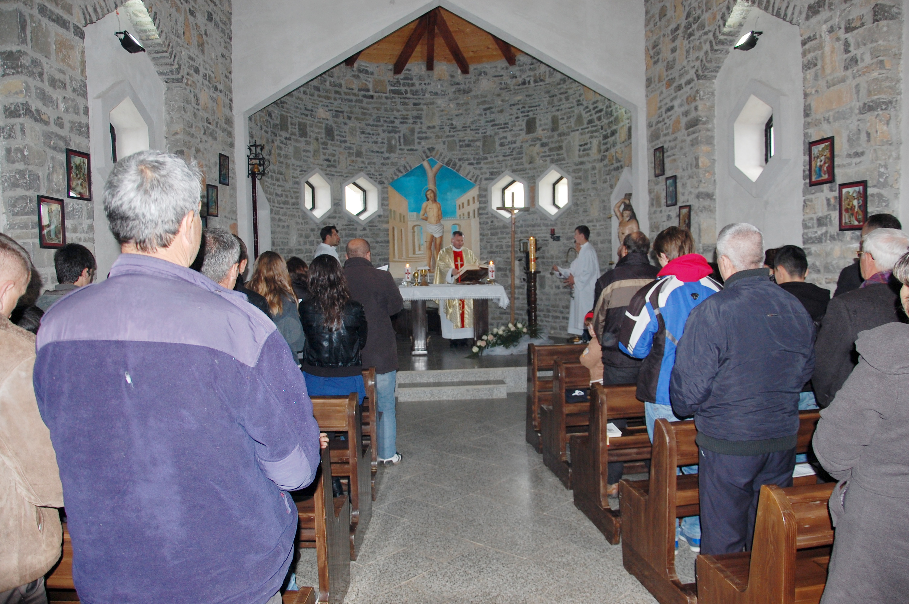 Members of the Catholic comunity and minority in Kosovo attend Holy Mass