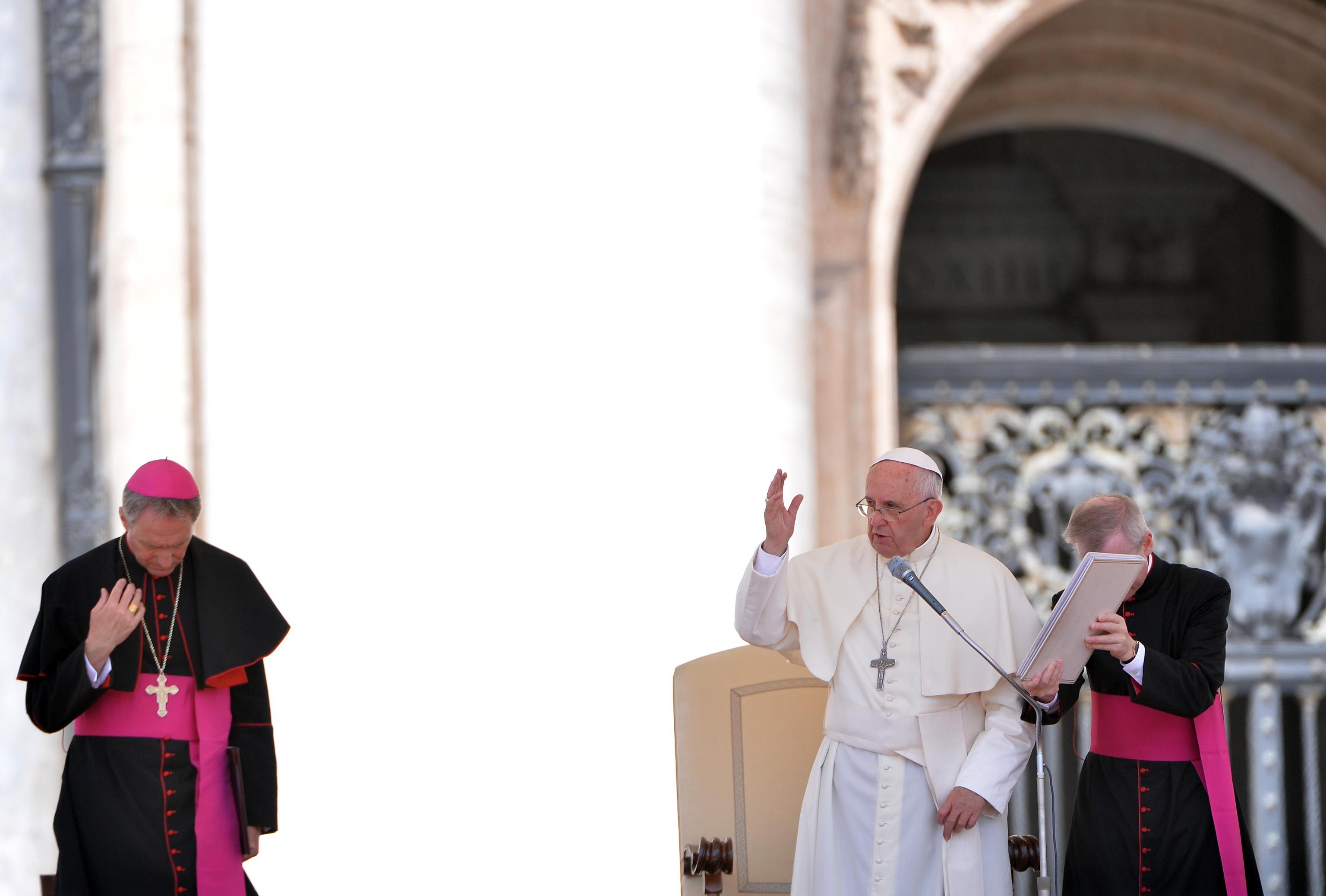 Pope Francis blesses the faithful during his weekly general audience