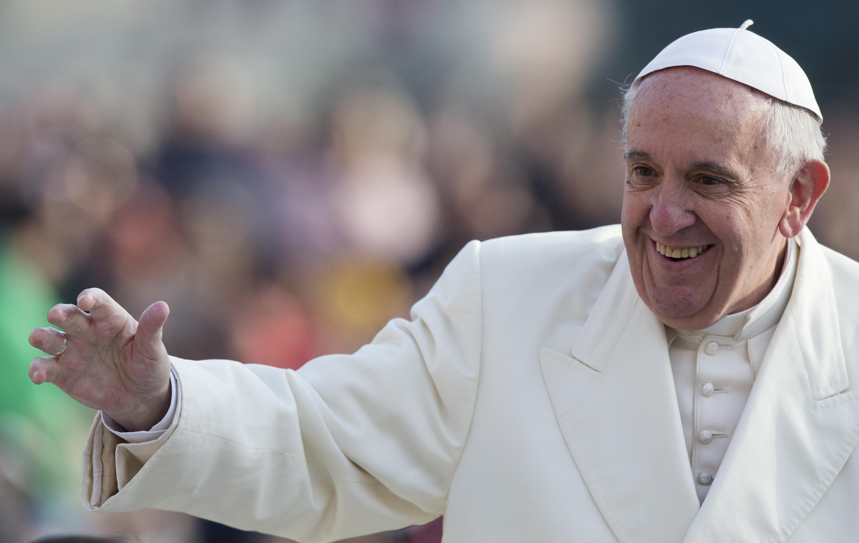 Pope Francis greets faithful at the beginning of the General audience on Wednesday 9th of December 2015