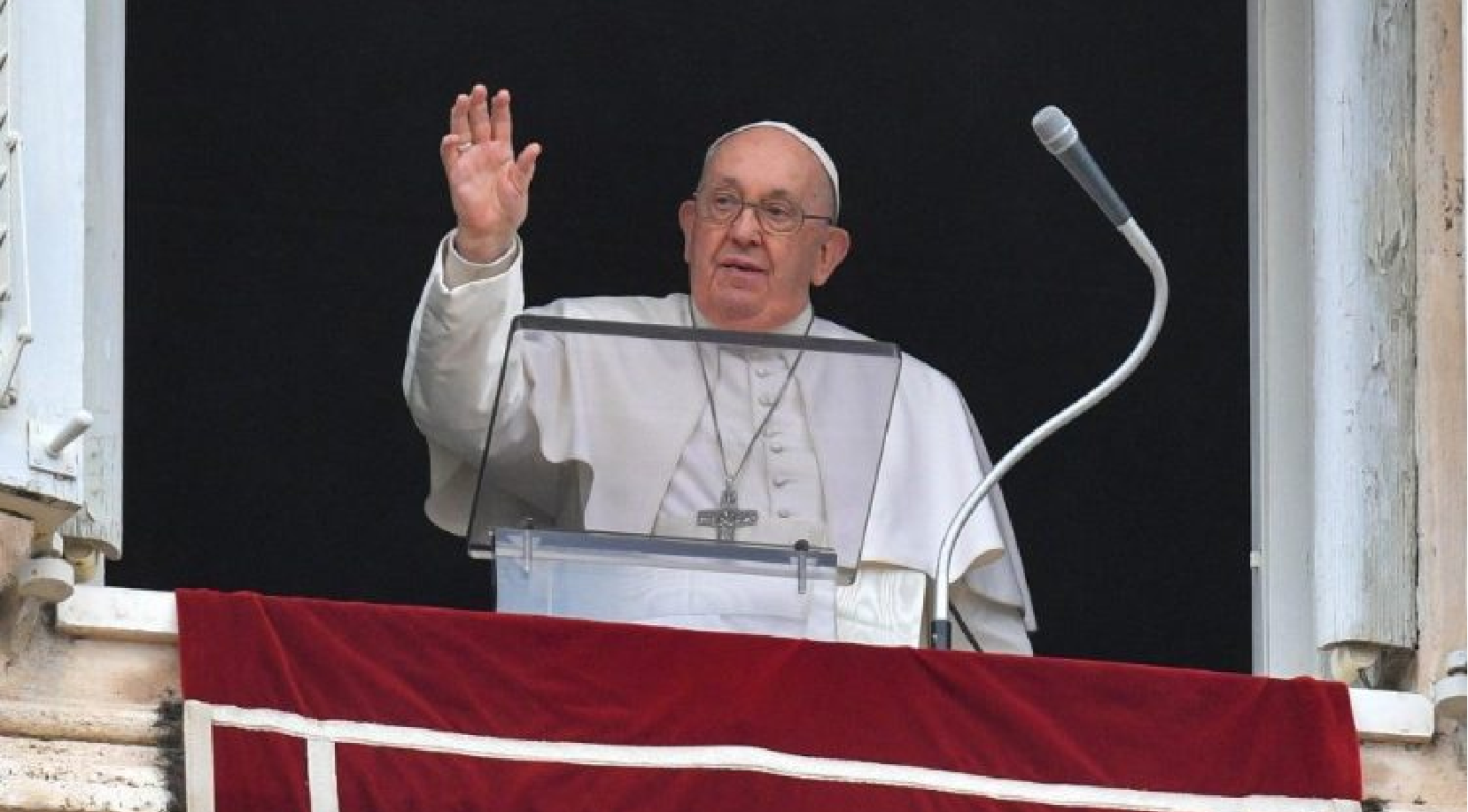 Pope Francis prayed the Angelus from the window of his papal apartment with at least 15,000 pilgrims and tourists