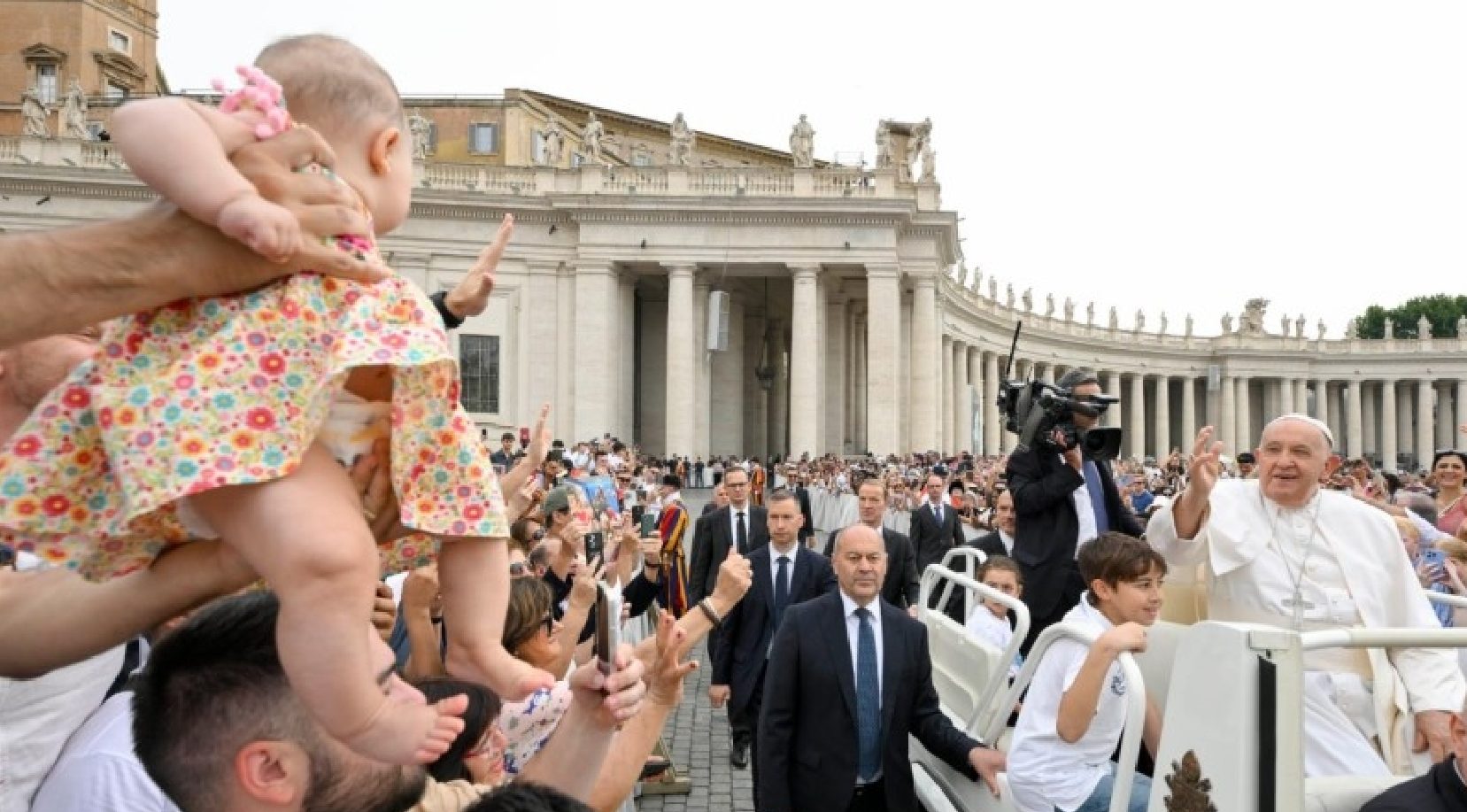 After the ride in the popemobile, he began with the traditional catechesis