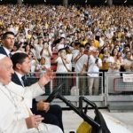 where he climbed into a golf cart to greet the 50,000 faithful who had come to witness the occasion