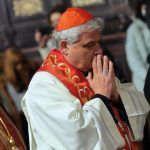 Pope’s Cardinal Almoner Holds Alms Basket for Participants in the Synod