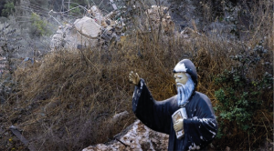 Among the wreckage, a statue of Saint Charbel, the town’s revered Catholic patron, stood covered in dust