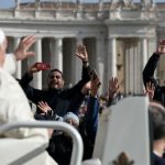 The Pope appeared in a white coat, reflecting the change in weather in Rome